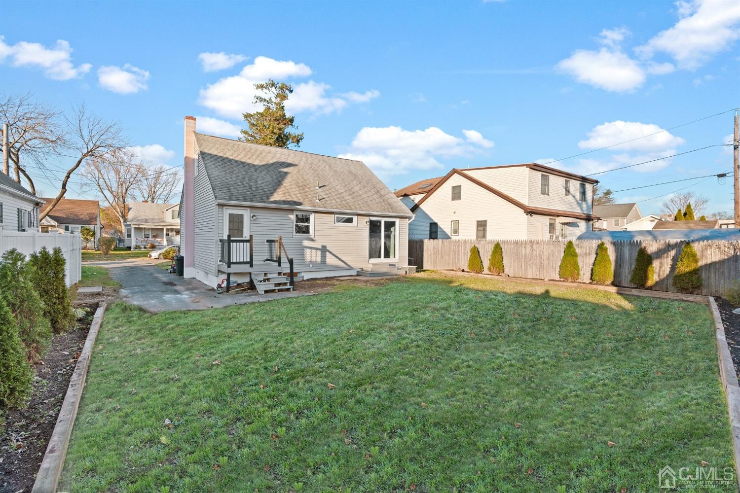 403 Fulton Street Middlesex, NJ 08846 - Photo 25 of 31 a view of a house with backyard porch and sitting area