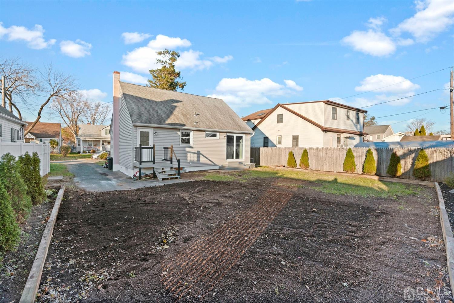 403 Fulton Street Middlesex, NJ 08846 - Photo 26 of 31 a view of a house with a yard