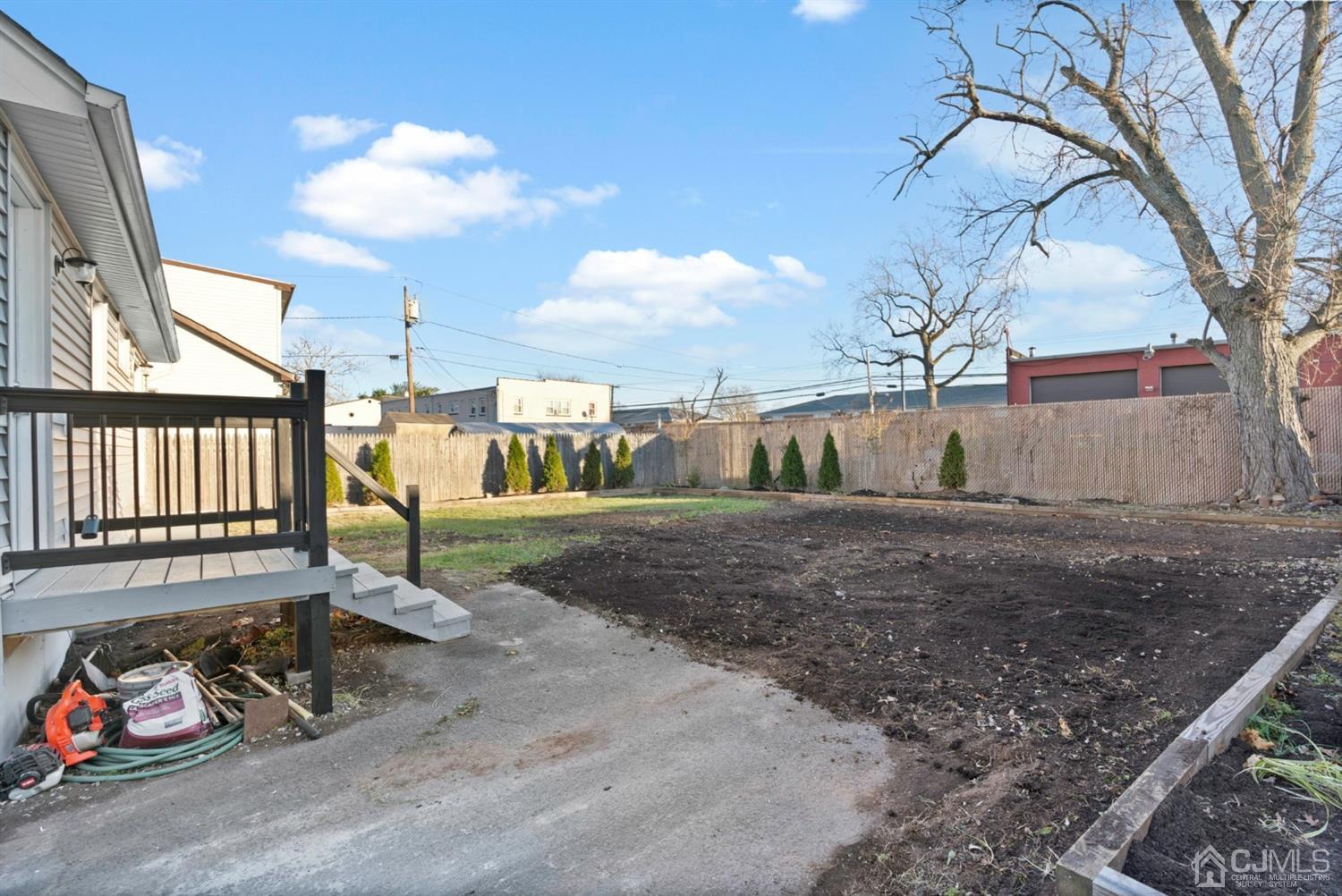 403 Fulton Street Middlesex, NJ 08846 - Photo 27 of 31 a view of a backyard with table and chairs