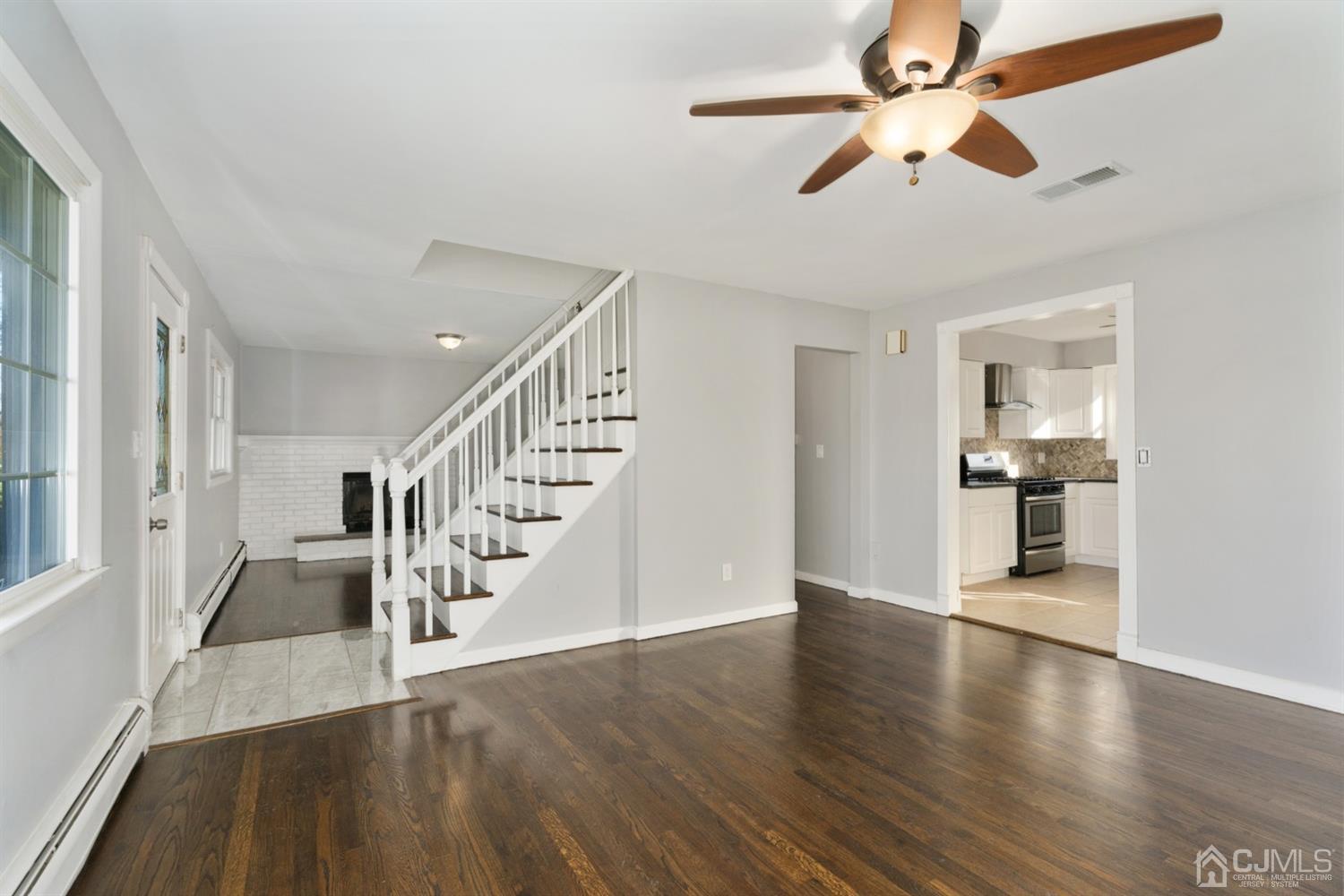 403 Fulton Street Middlesex, NJ 08846 - Photo 9 of 31 a view of entryway and hall with wooden floor