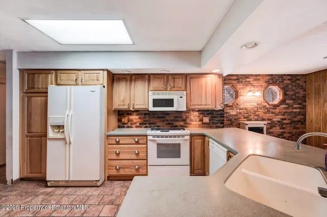 a view of an entryway with a chandelier