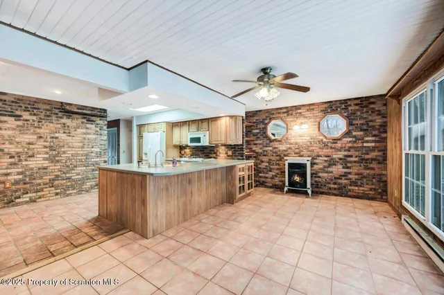 a view of empty room with windows