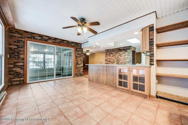 a view of an entryway with a chandelier