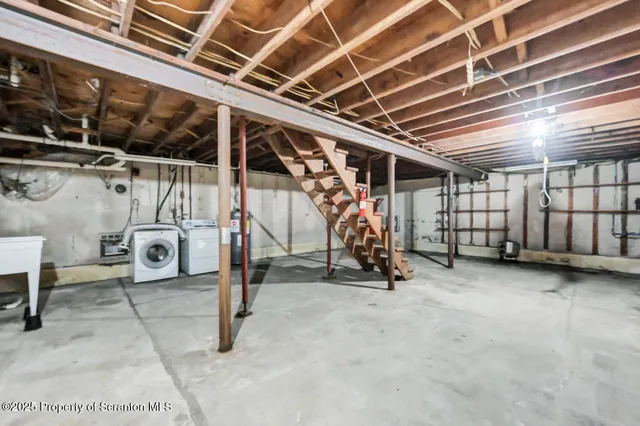 a view of a white house with a yard