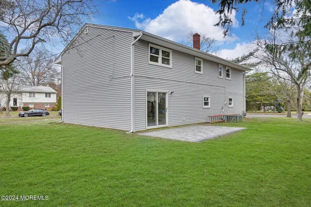 a view of a backyard of the house