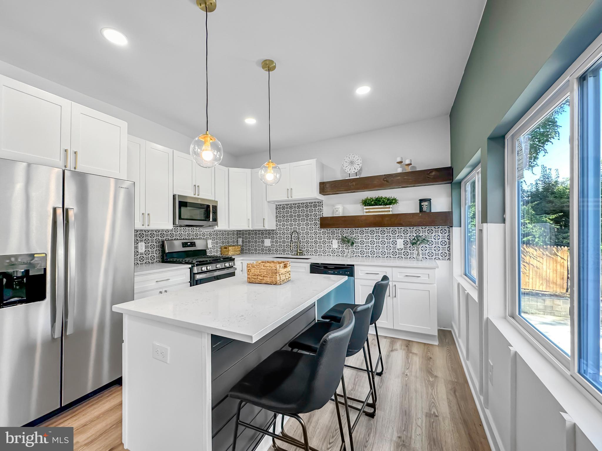 4704 Beauford Road Morningside, MD 20746 - Photo 10 of 28 Kitchen with Granite Counter Island