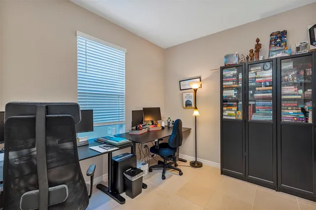 a view of a workspace with furniture
