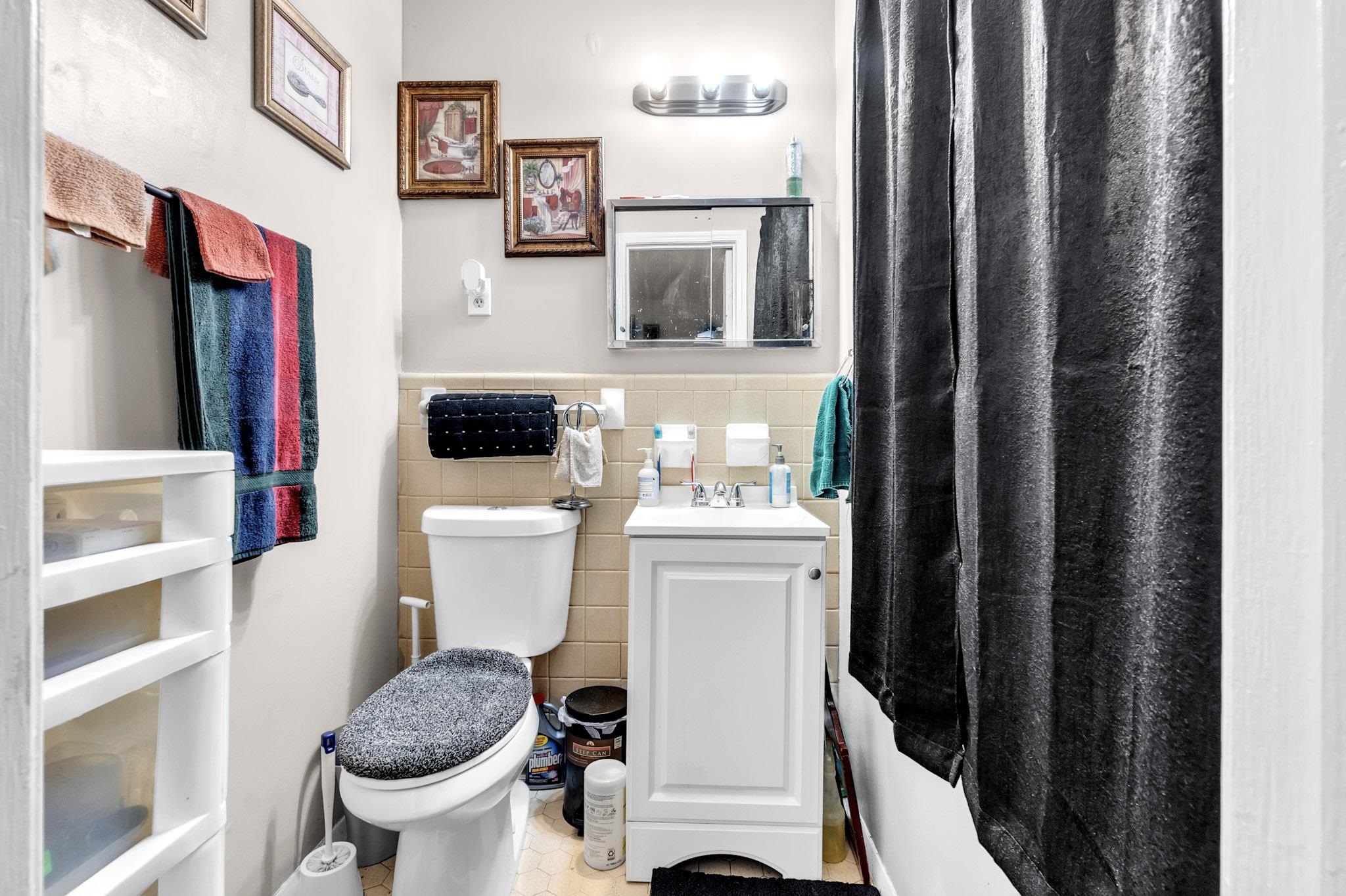 4905 Fernbrook Drive Memphis, TN 38118 - Photo 7 of 9 a bathroom with a toilet and a sink