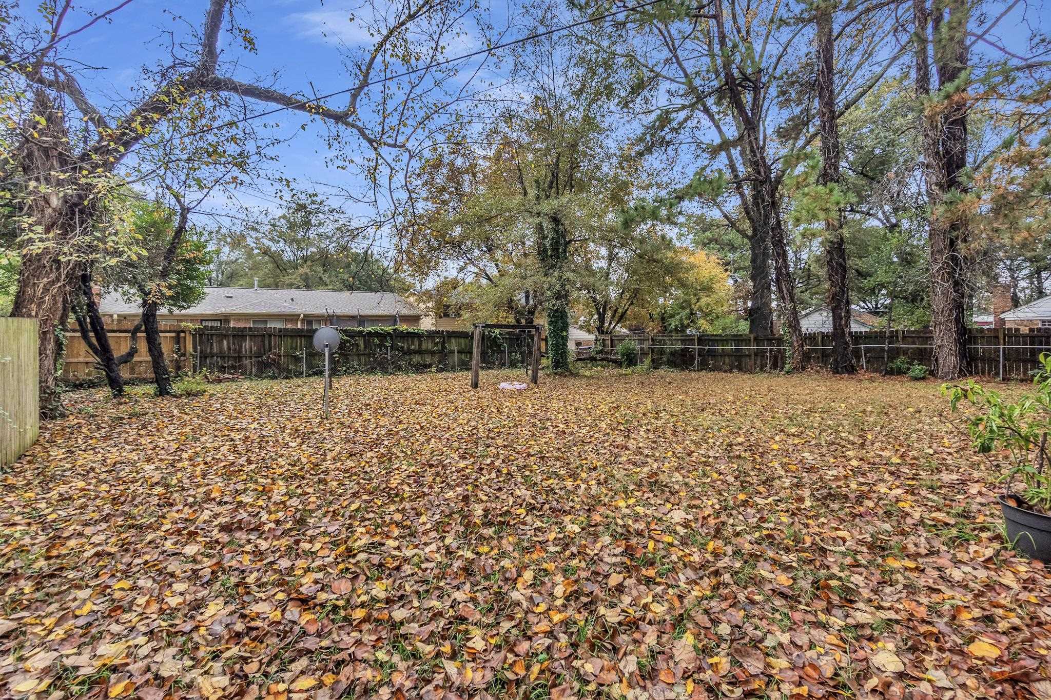 4905 Fernbrook Drive Memphis, TN 38118 - Photo 9 of 9 a front view of house with a garden