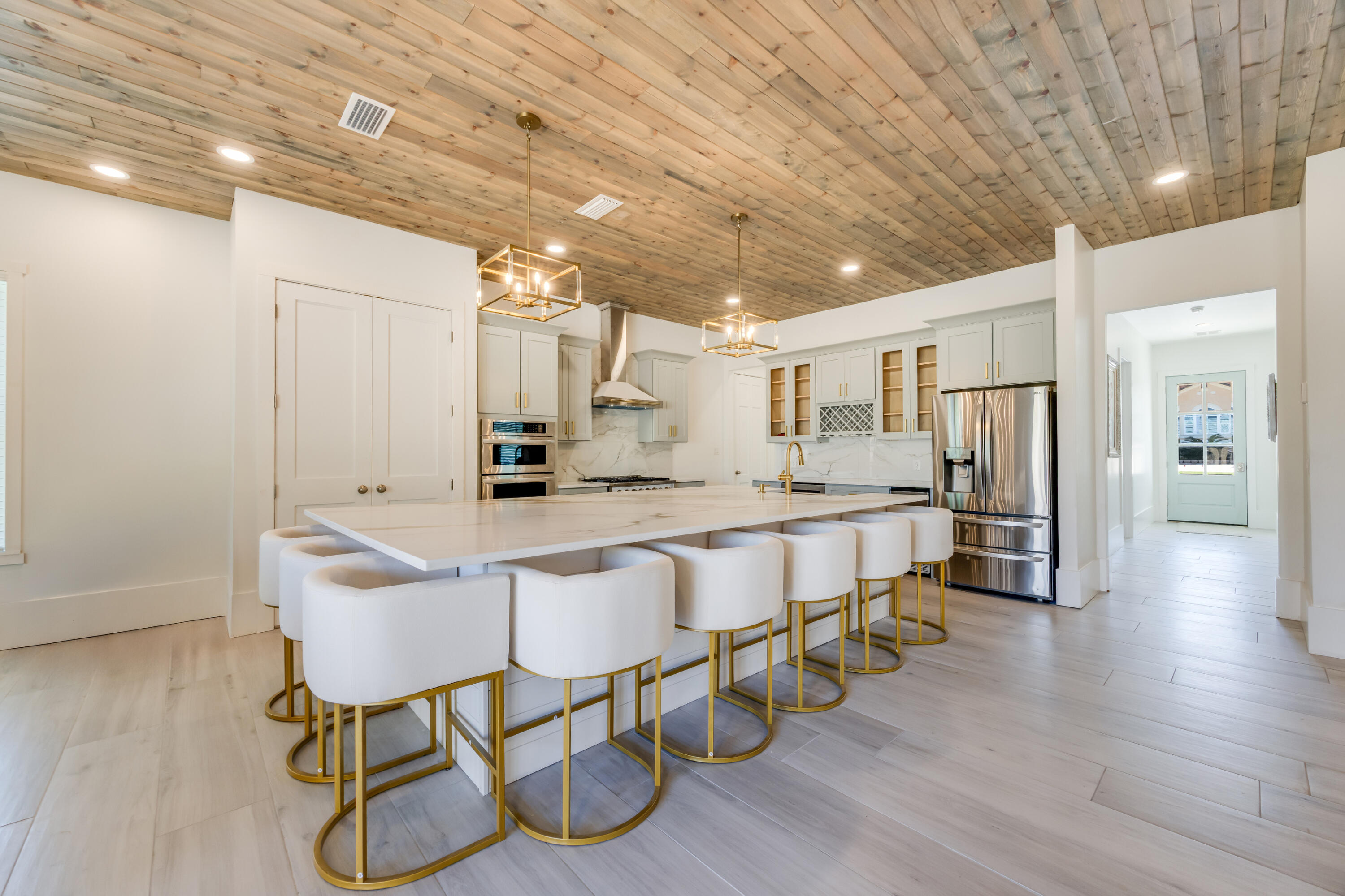 41 Mobile Street Miramar Beach, FL 32550 - Photo 12 of 80 a large kitchen with a table and chairs