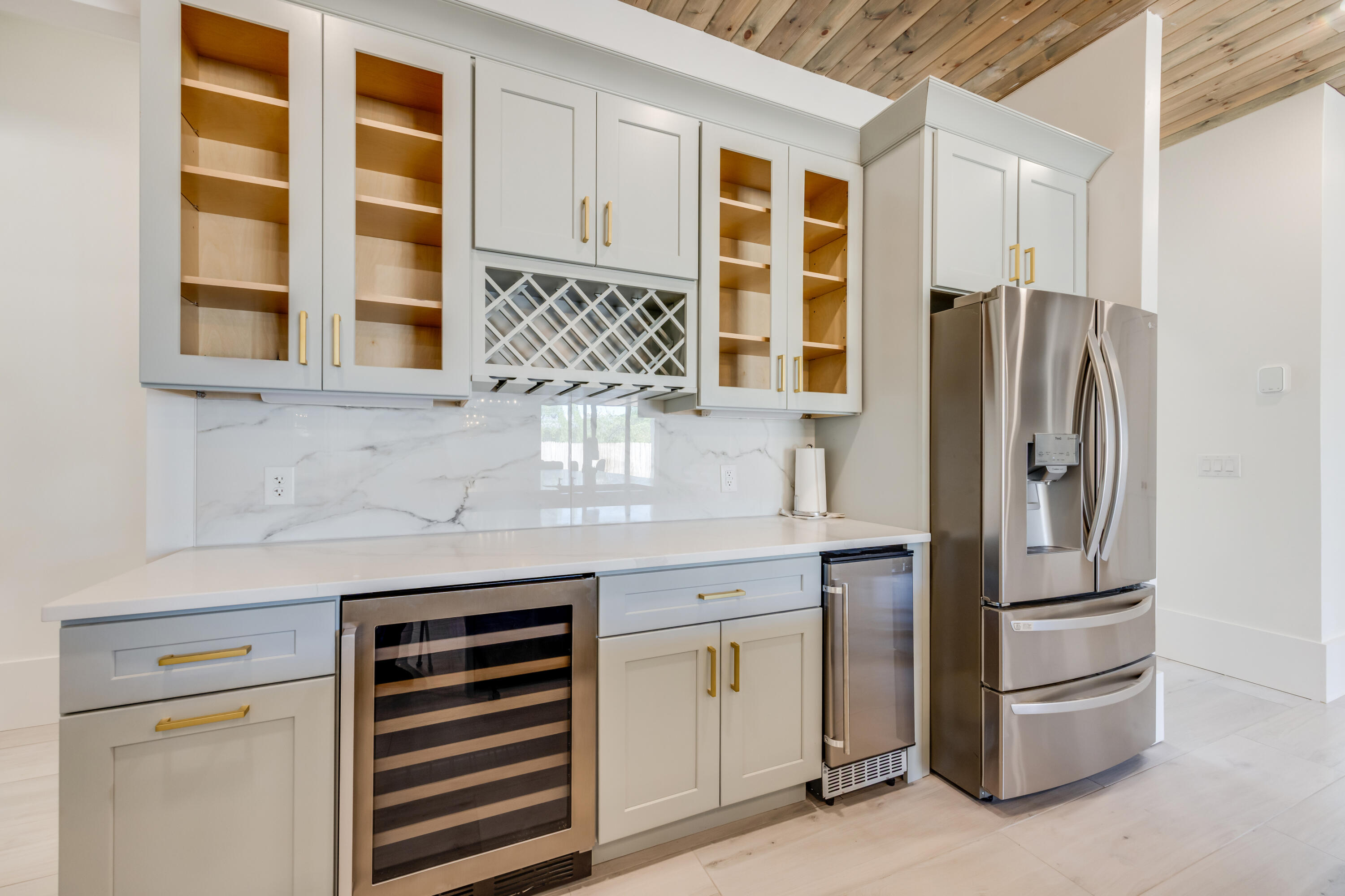 41 Mobile Street Miramar Beach, FL 32550 - Photo 18 of 80 a kitchen with stainless steel appliances granite countertop a refrigerator and cabinets