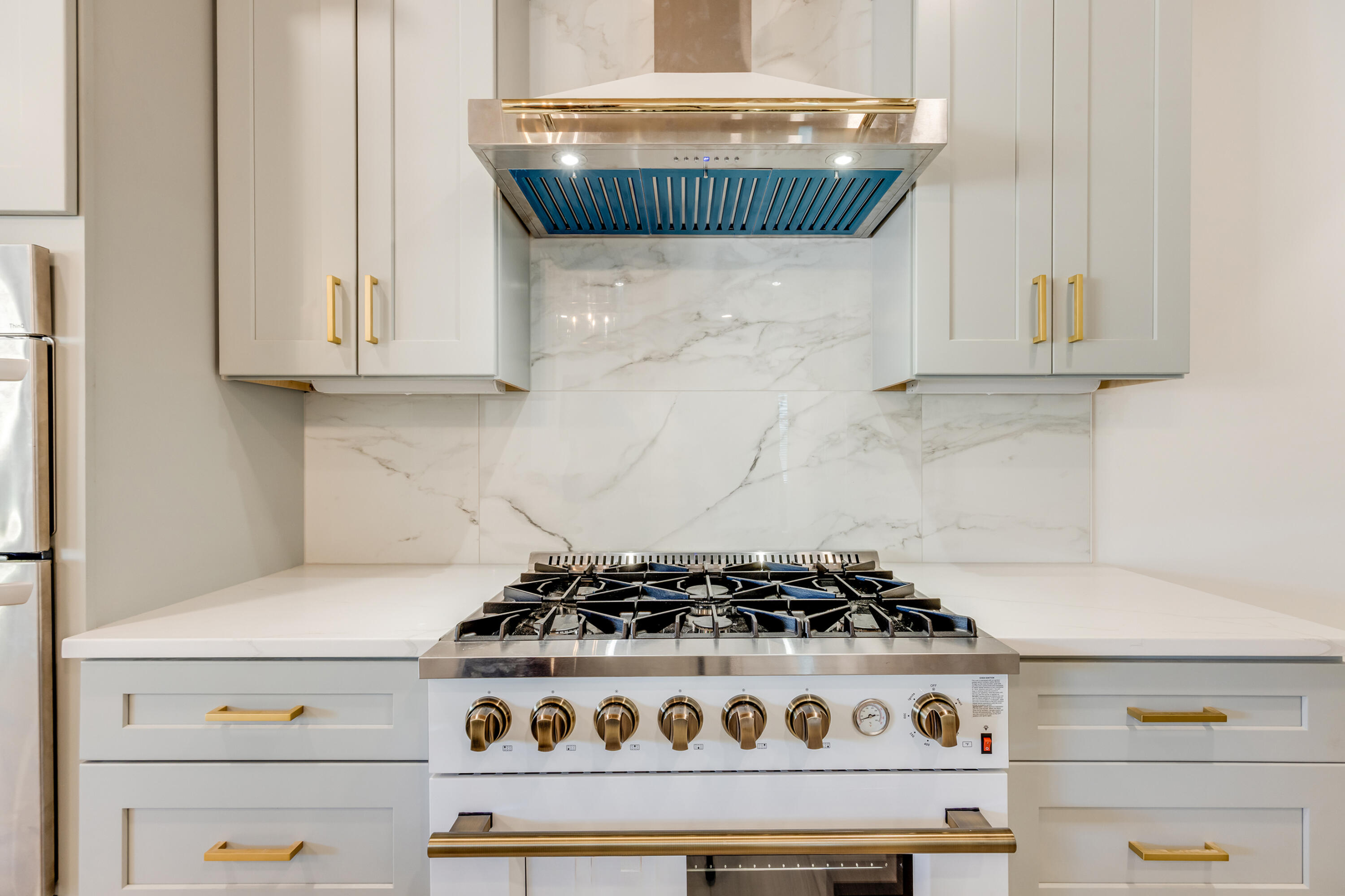41 Mobile Street Miramar Beach, FL 32550 - Photo 22 of 80 a kitchen with a stove and cabinets