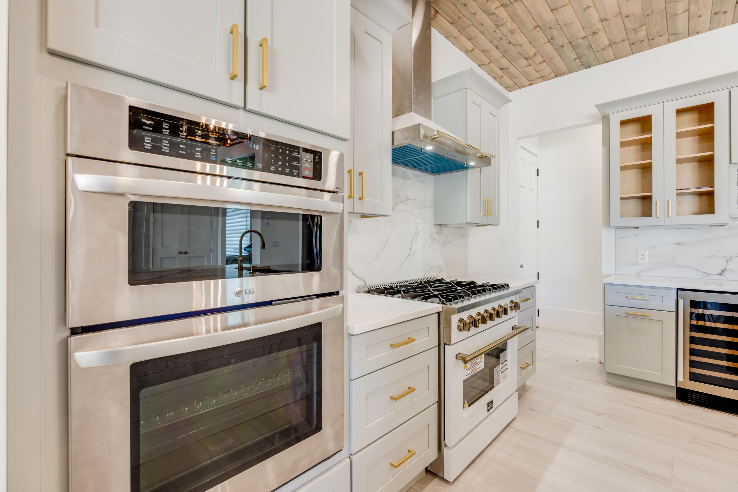 41 Mobile Street Miramar Beach, FL 32550 - Photo 23 of 80 a kitchen with stainless steel appliances granite countertop a stove and a microwave