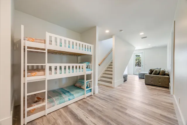 a bathroom with a sink a mirror and a shower