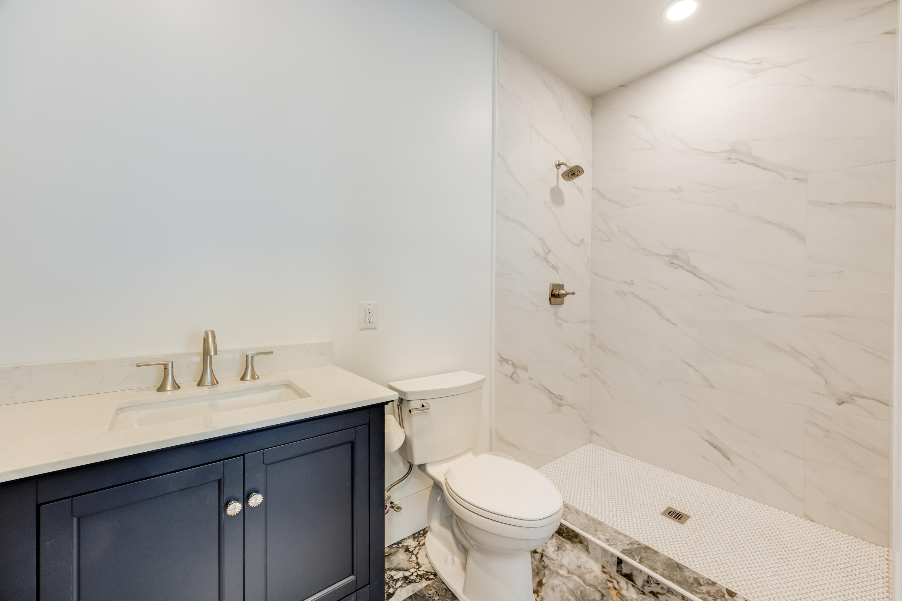 41 Mobile Street Miramar Beach, FL 32550 - Photo 43 of 80 a bathroom with a sink a toilet and shower