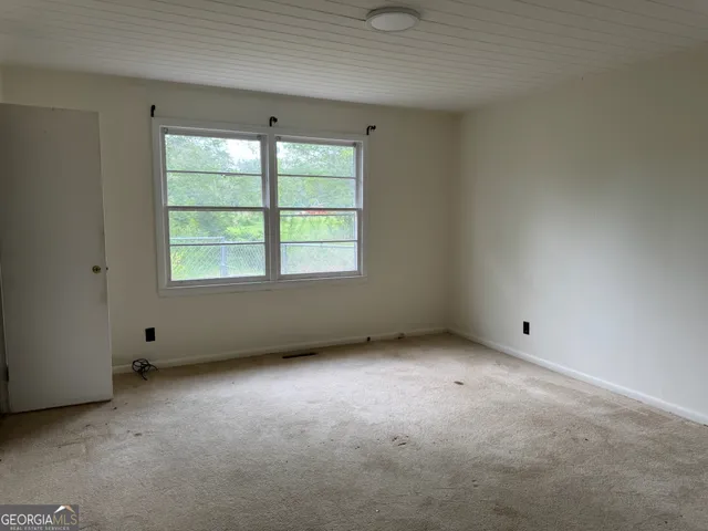 an empty room with a window