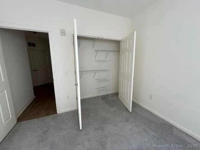 an empty room with closet