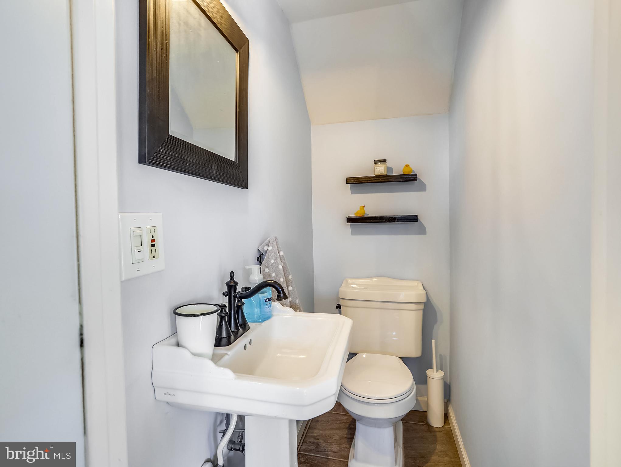 211 Laurel Road Linthicum Heights, MD 21090 - Photo 6 of 33 Half bath on main level