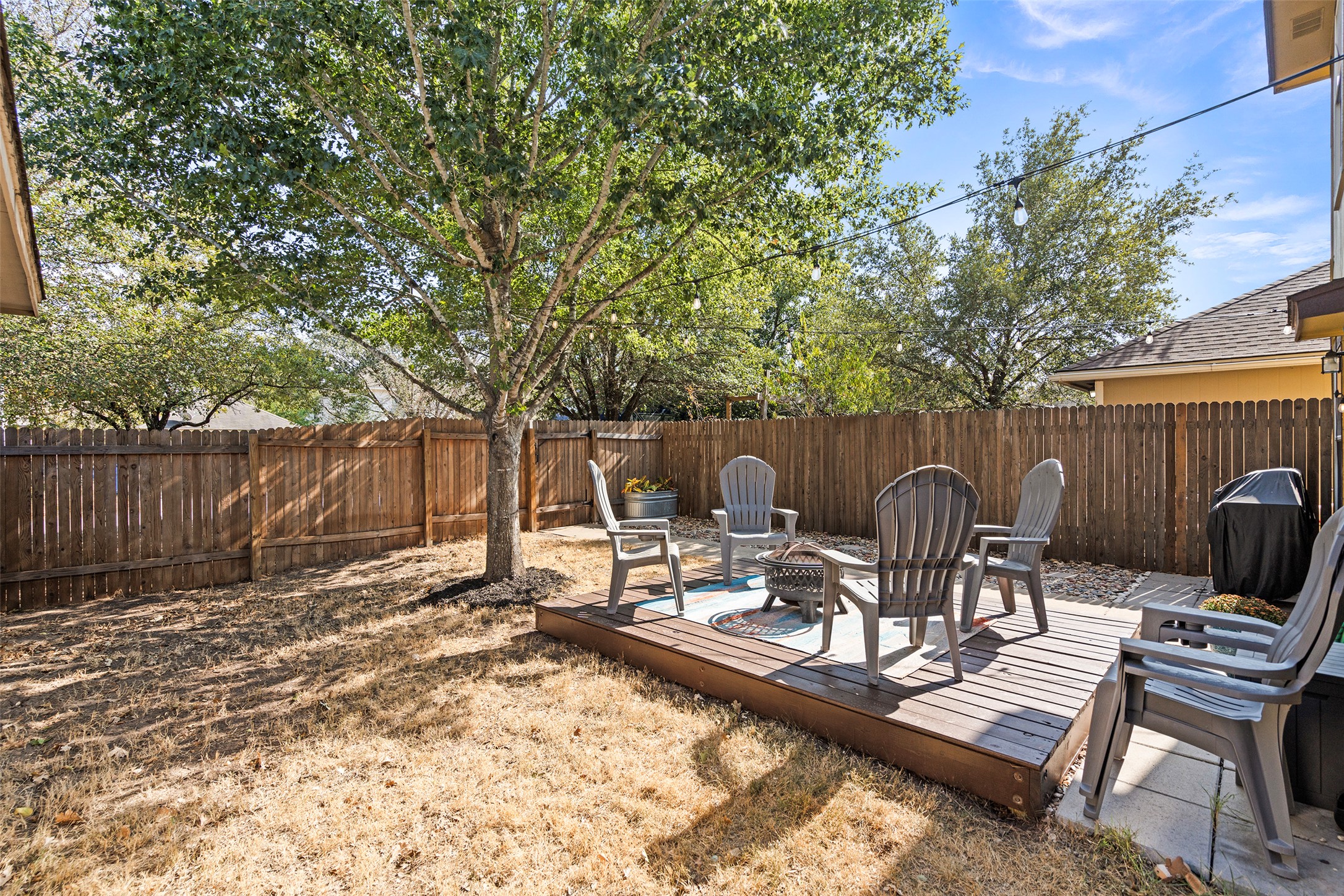 4529 Best Way Austin, TX 78725 - Photo 30 of 33 a view of a backyard with a patio