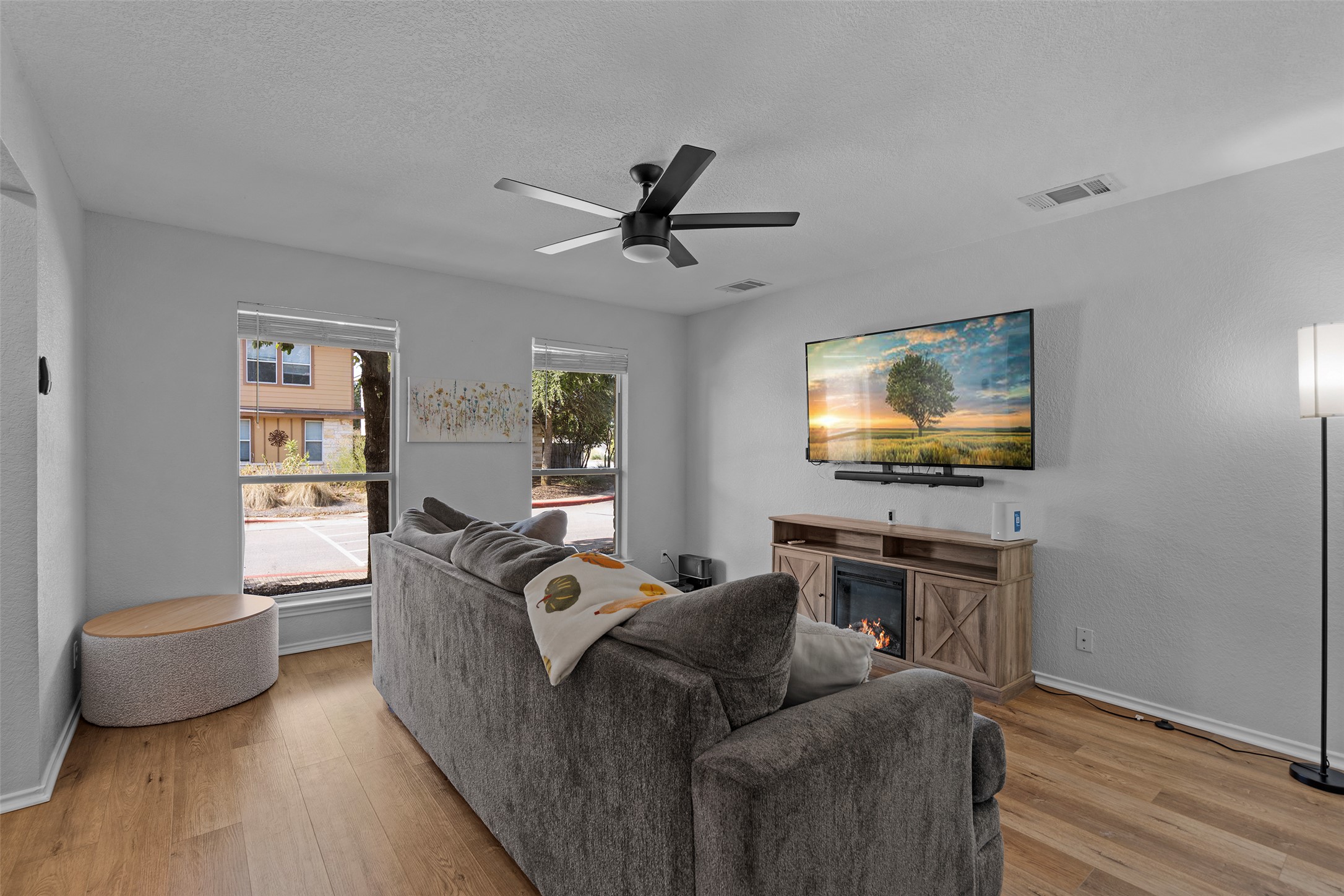 4529 Best Way Austin, TX 78725 - Photo 5 of 33 a living room with furniture and a flat screen tv