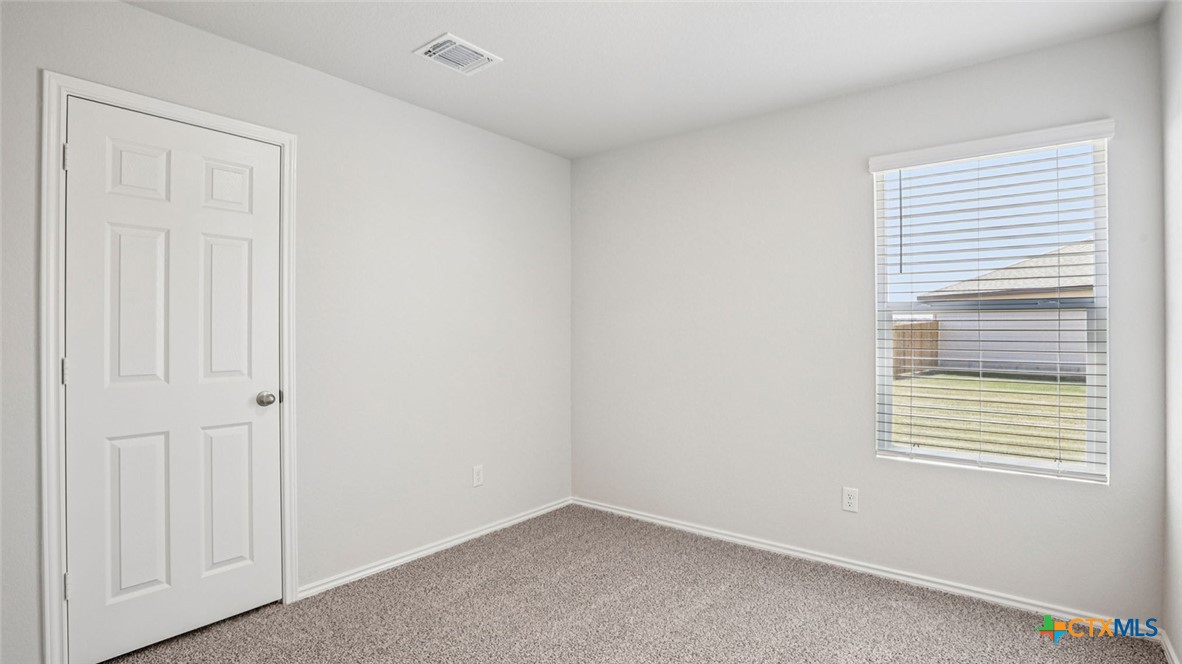 1303 Newey Circle Temple, TX 76504 - Photo 25 of 33 an empty room with windows