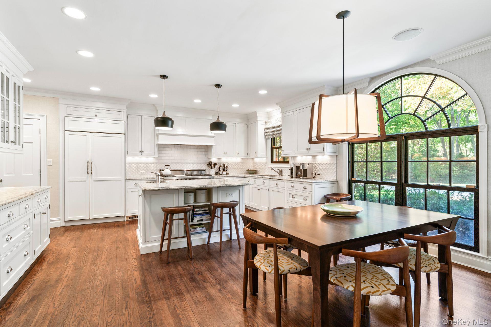 30 Underhill Road Locust Valley, NY 11560 - Photo 3 of 5 Dining area featuring dark wood-type flooring, recessed lighting, and ornamental molding