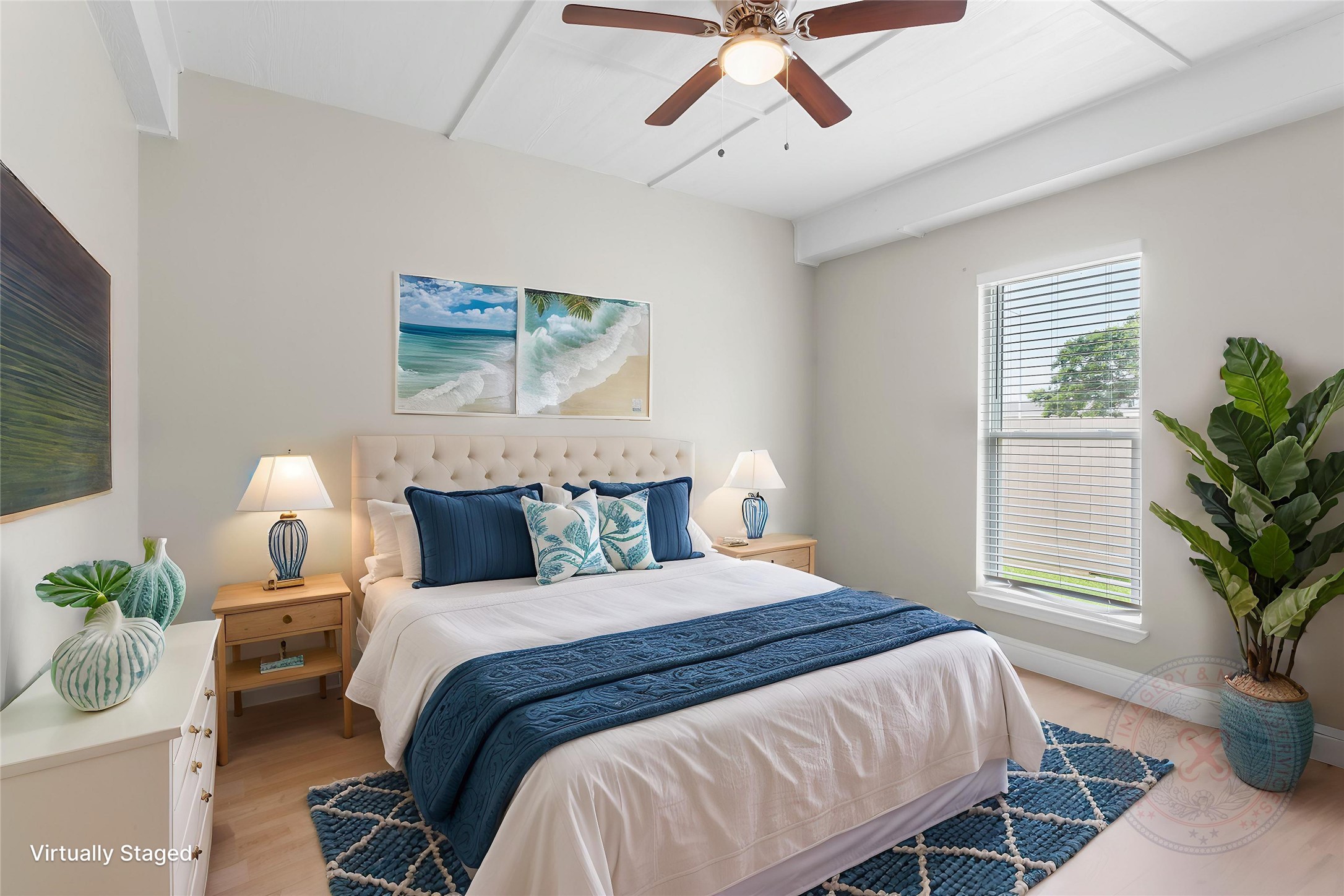 610 South Shady Lane La Porte, TX 77571 - Photo 41 of 50 This is a cozy bedroom featuring a large window, ceiling fan, mini split AC, with abundant natural light.