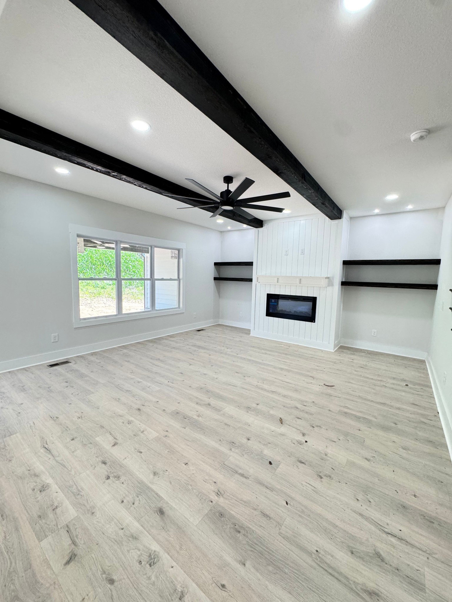 1725 Powell Road Clarksville, TN 37043 - Photo 22 of 42 a view of empty room with wooden floor