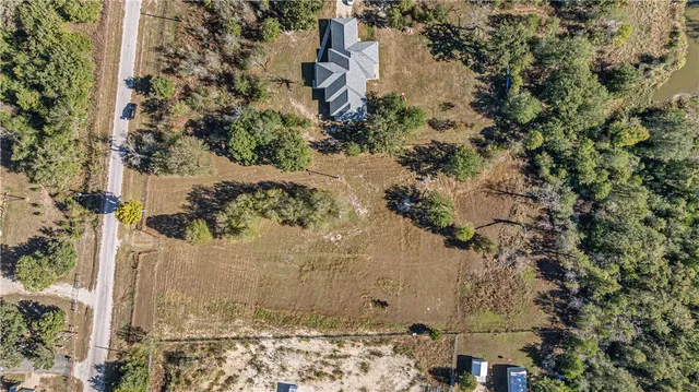 a view of a yard with an outdoor space