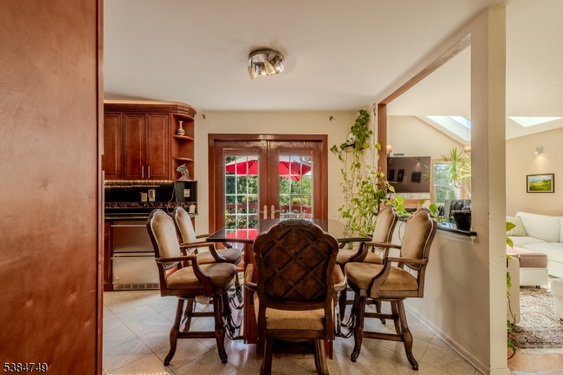85 Swenson Circle Berkeley Heights, NJ 07922 - Photo 13 of 47 a view of a dining room with furniture and chandelier