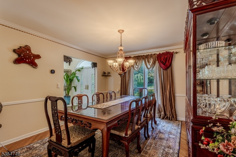85 Swenson Circle Berkeley Heights, NJ 07922 - Photo 15 of 47 a view of a dining room with furniture window and outside view