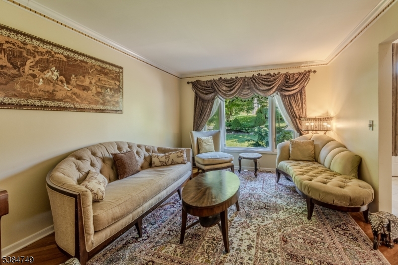 85 Swenson Circle Berkeley Heights, NJ 07922 - Photo 18 of 47 a living room with furniture and a large window