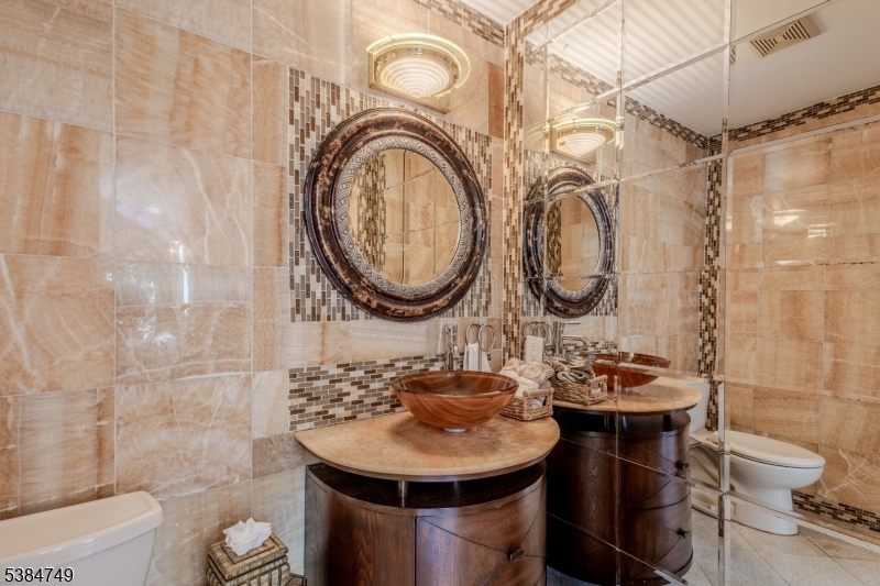 85 Swenson Circle Berkeley Heights, NJ 07922 - Photo 20 of 47 a bathroom with a sink and a mirror