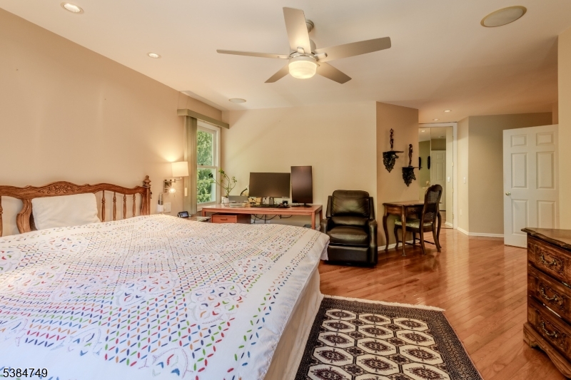 85 Swenson Circle Berkeley Heights, NJ 07922 - Photo 24 of 47 a bed room with a bed and furniture