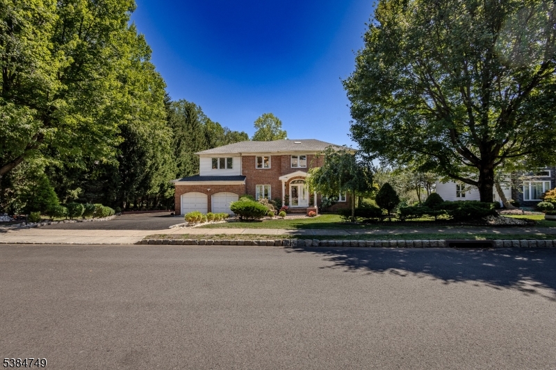 85 Swenson Circle Berkeley Heights, NJ 07922 - Photo 3 of 47 a front view of a house with a yard