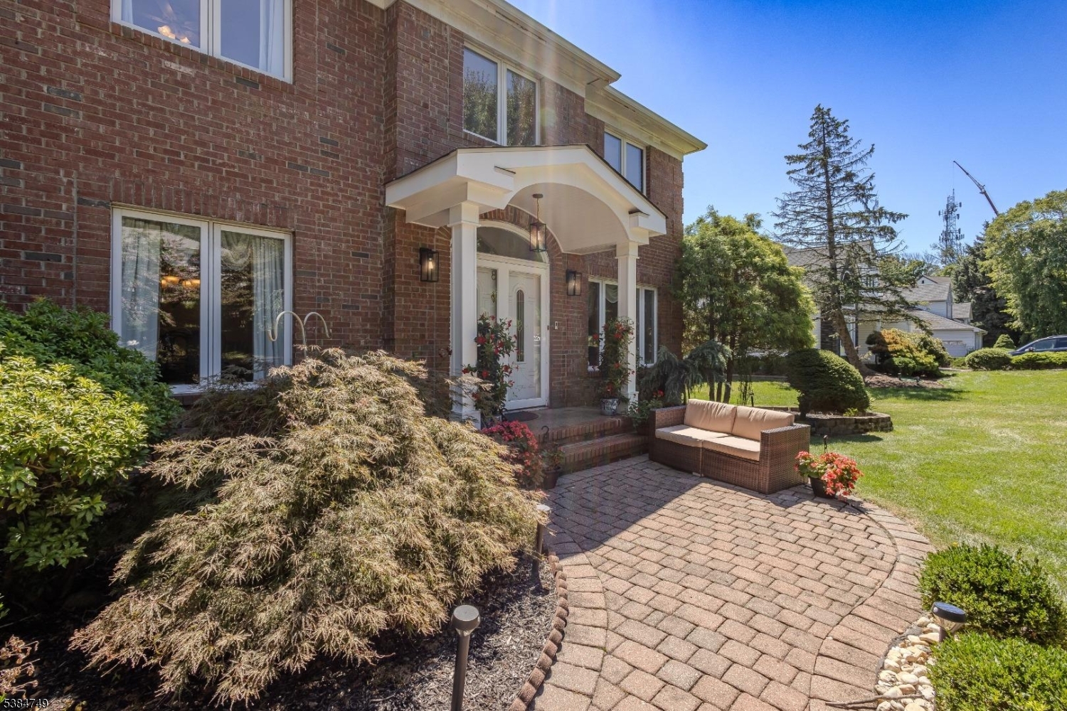 85 Swenson Circle Berkeley Heights, NJ 07922 - Photo 4 of 47 a front view of a house with garden