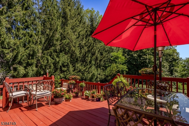 85 Swenson Circle Berkeley Heights, NJ 07922 - Photo 41 of 47 swimming pool with outdoor seating and wooden floor