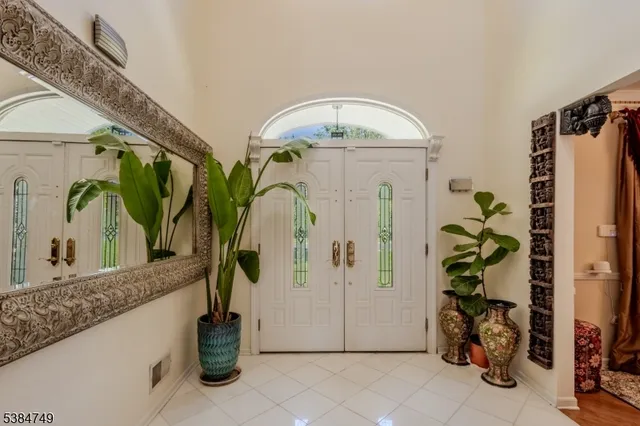 a view of hall way with furniture