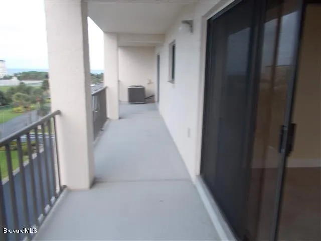 a view of a balcony with city view