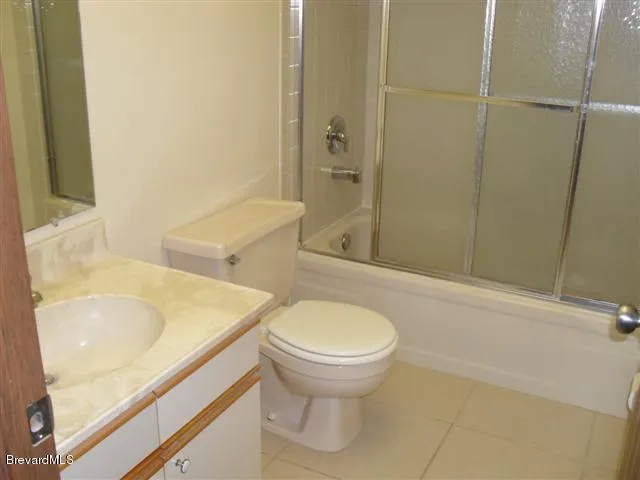 a bathroom with a sink and toilet