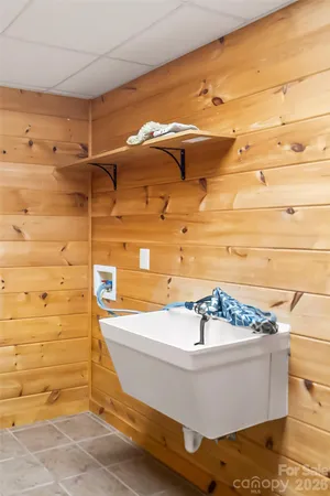 a white bath tub sitting in a bathroom