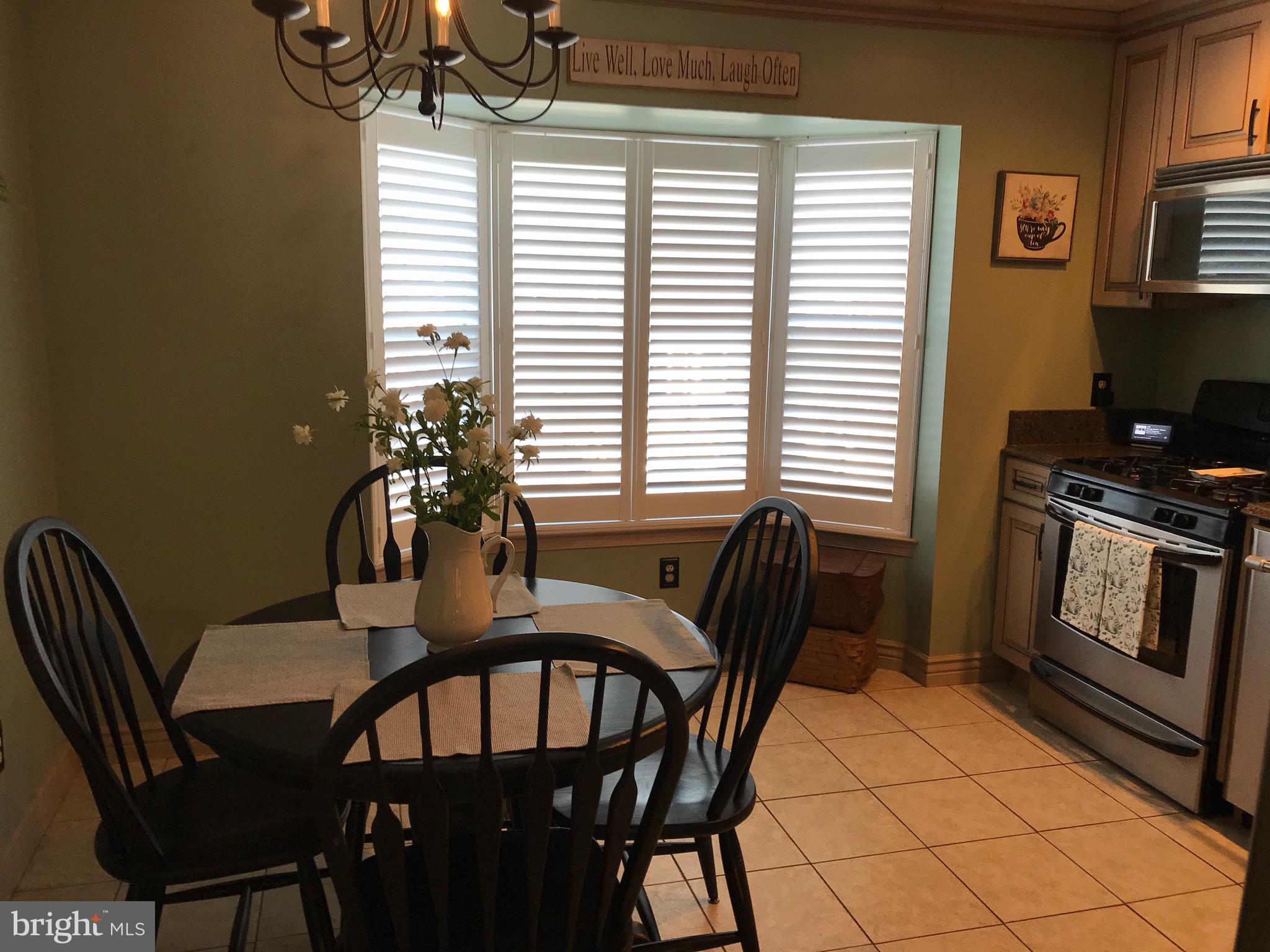 25 Powderock Place Baltimore, MD 21236 - Photo 8 of 36 Custom plantation blinds in kitchen