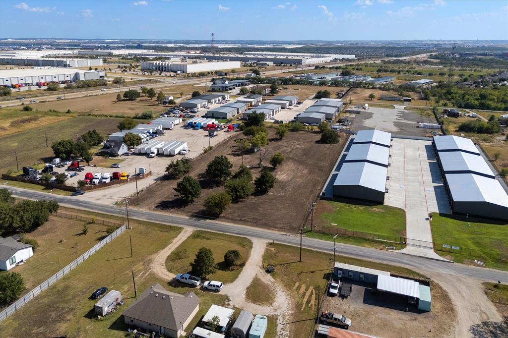 17326 Gaffield Road Justin, TX 76247 - Photo 14 of 21 Multiple commercial structures with metal roofs