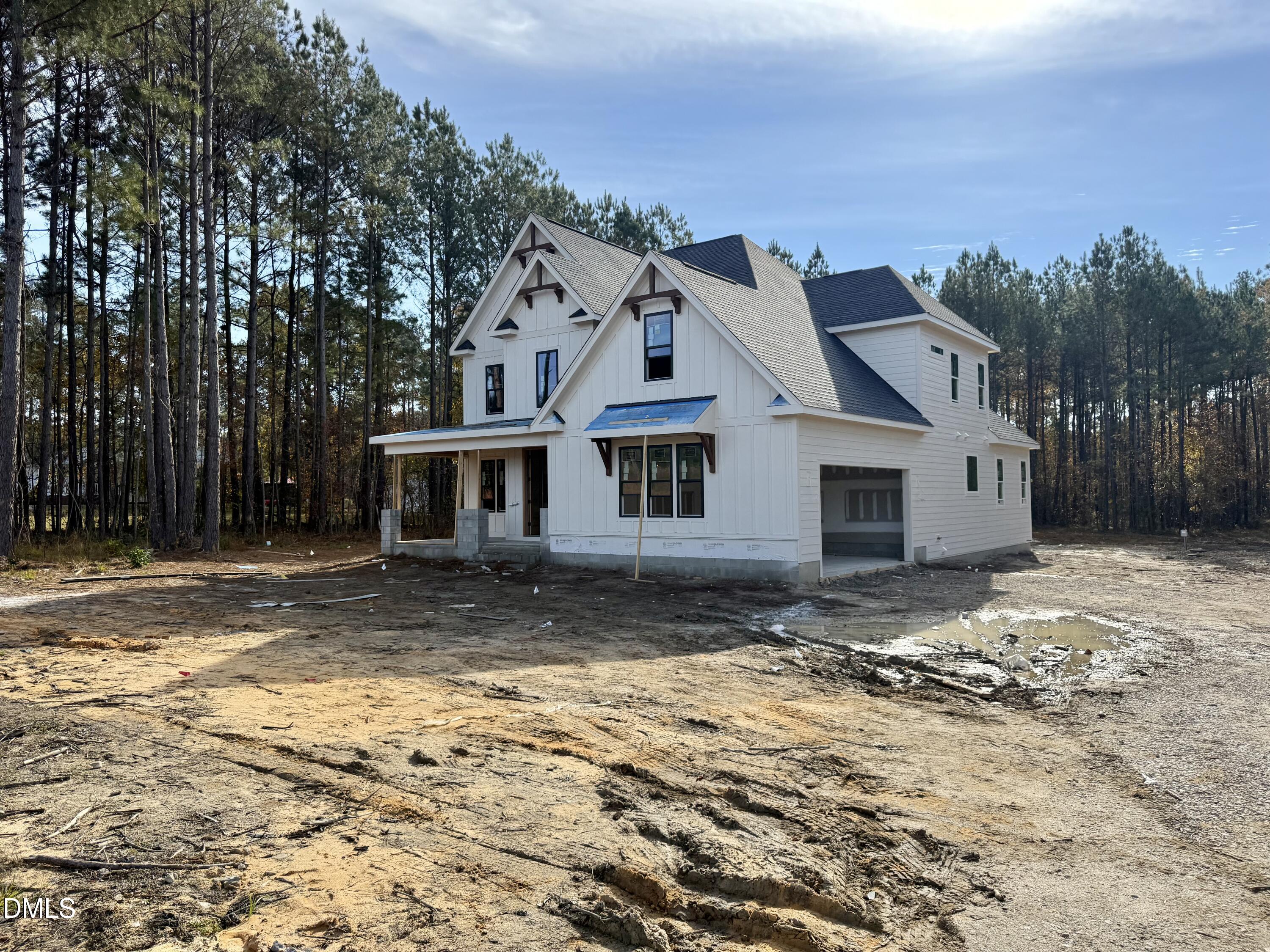 12601 Burgess Road Middlesex, NC 27557 - Photo 2 of 13 a view of a house with a yard covered in snow