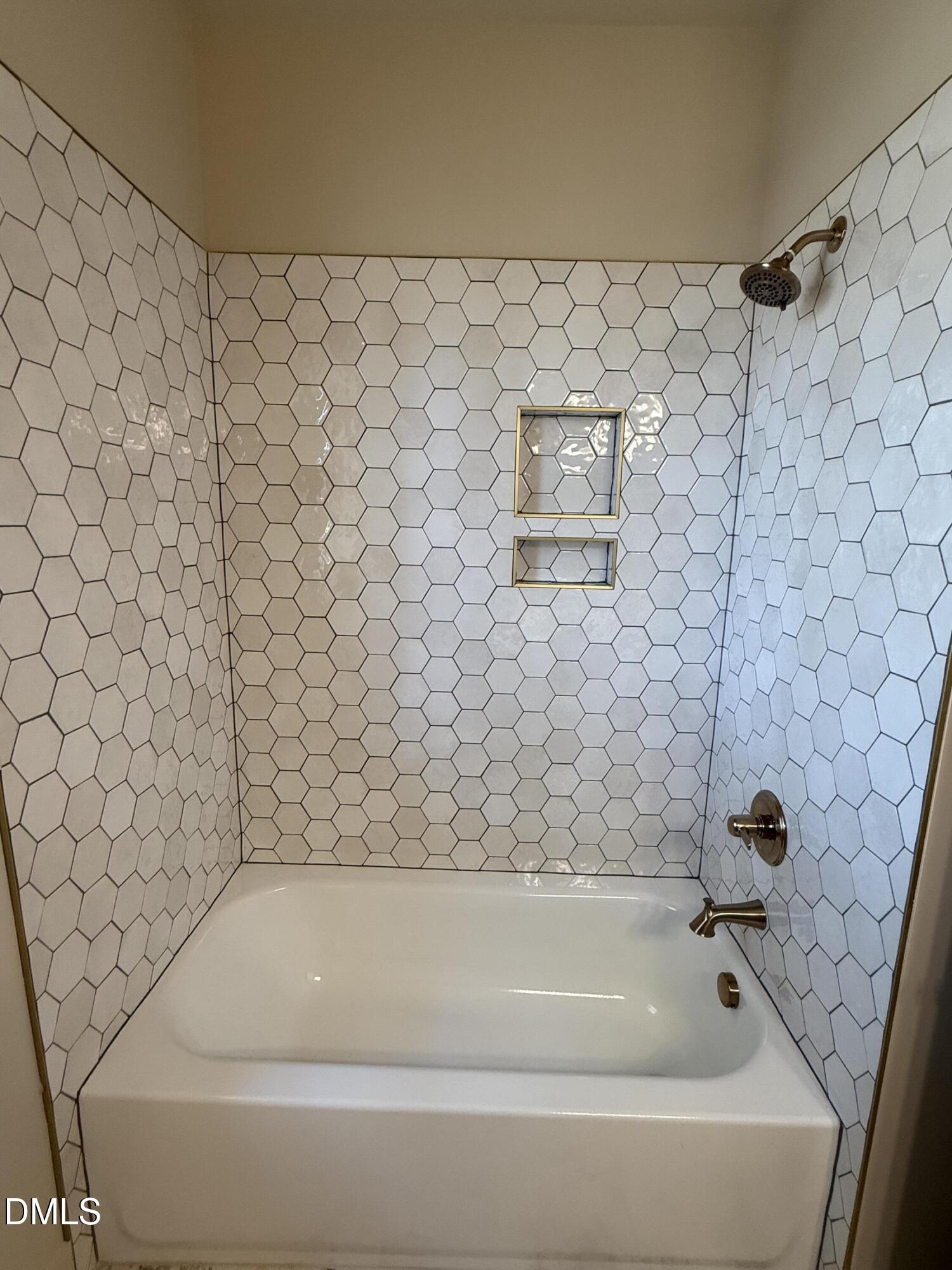 12601 Burgess Road Middlesex, NC 27557 - Photo 21 of 27 a bathroom with a bathtub