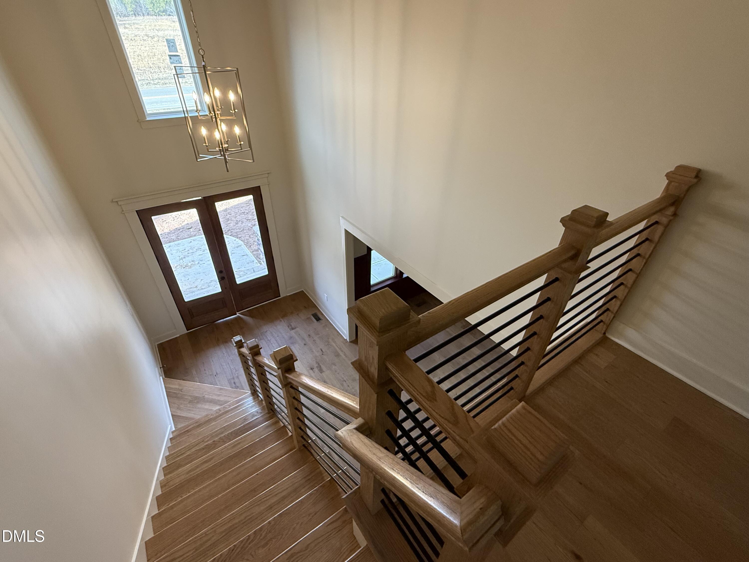 12601 Burgess Road Middlesex, NC 27557 - Photo 25 of 27 a view of an empty room with wooden floor