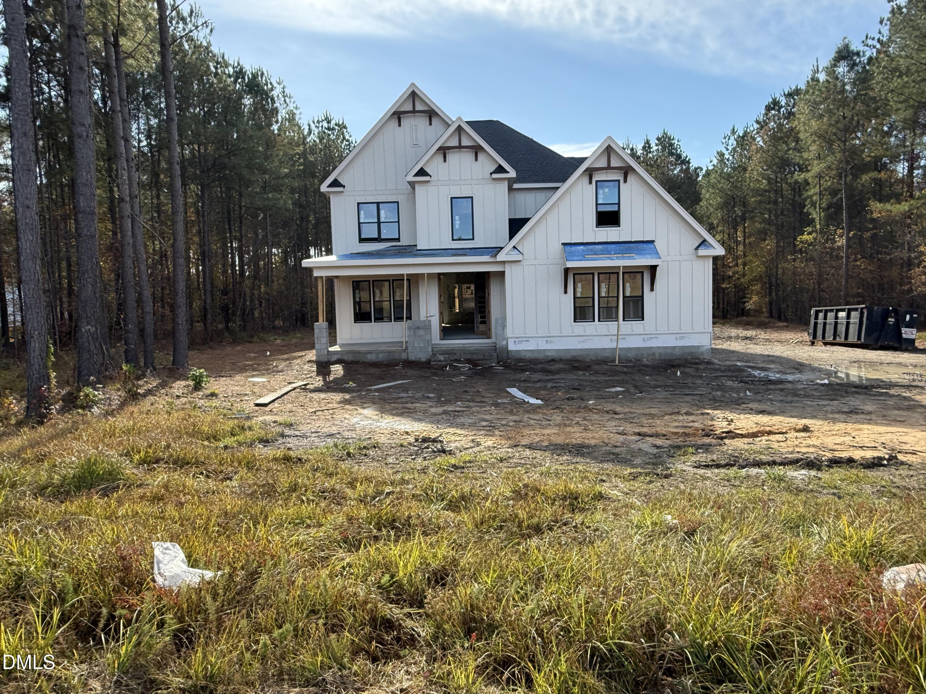 12601 Burgess Road Middlesex, NC 27557 - Photo 5 of 13 a view of a brick house with a yard