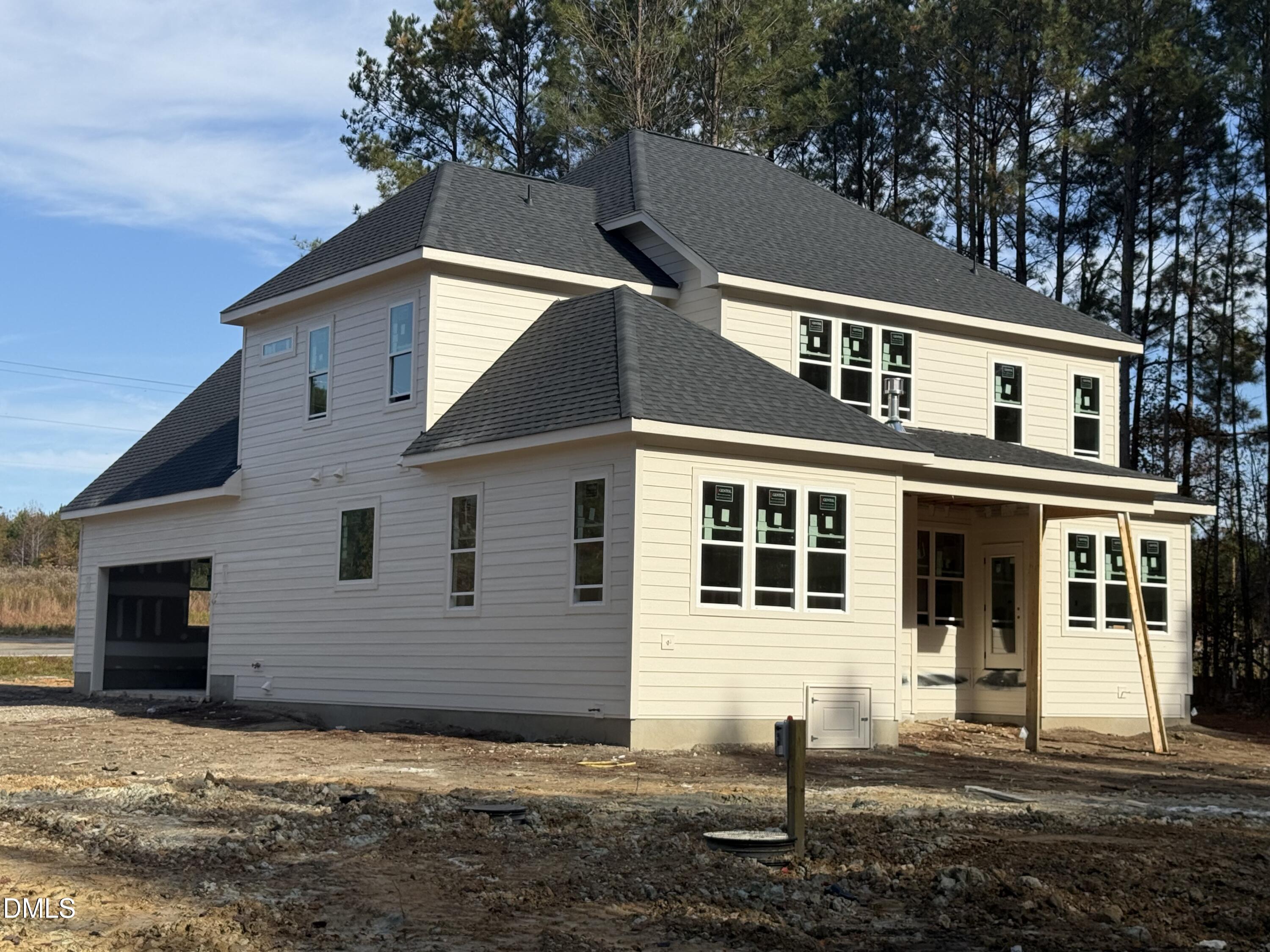 12601 Burgess Road Middlesex, NC 27557 - Photo 7 of 13 a front view of a house with a yard