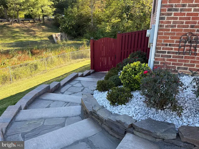 a garden view with a seating space