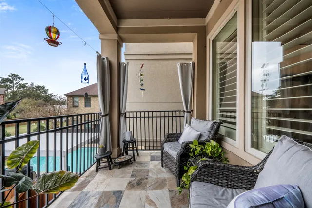 a view of a porch with furniture